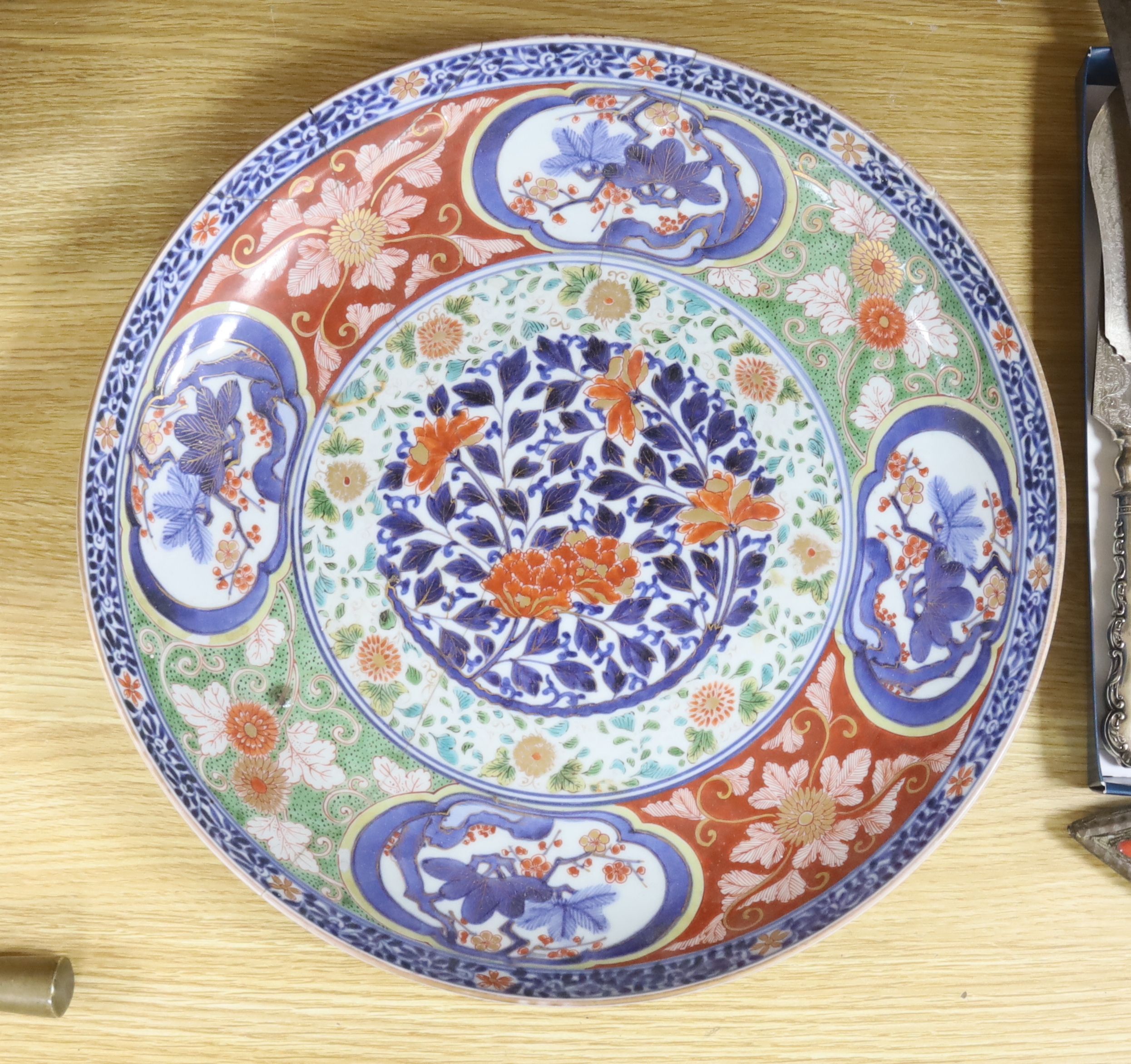 A Japanese Imari charger, pseudo Wanli mark, diameter 40cm (cracked)